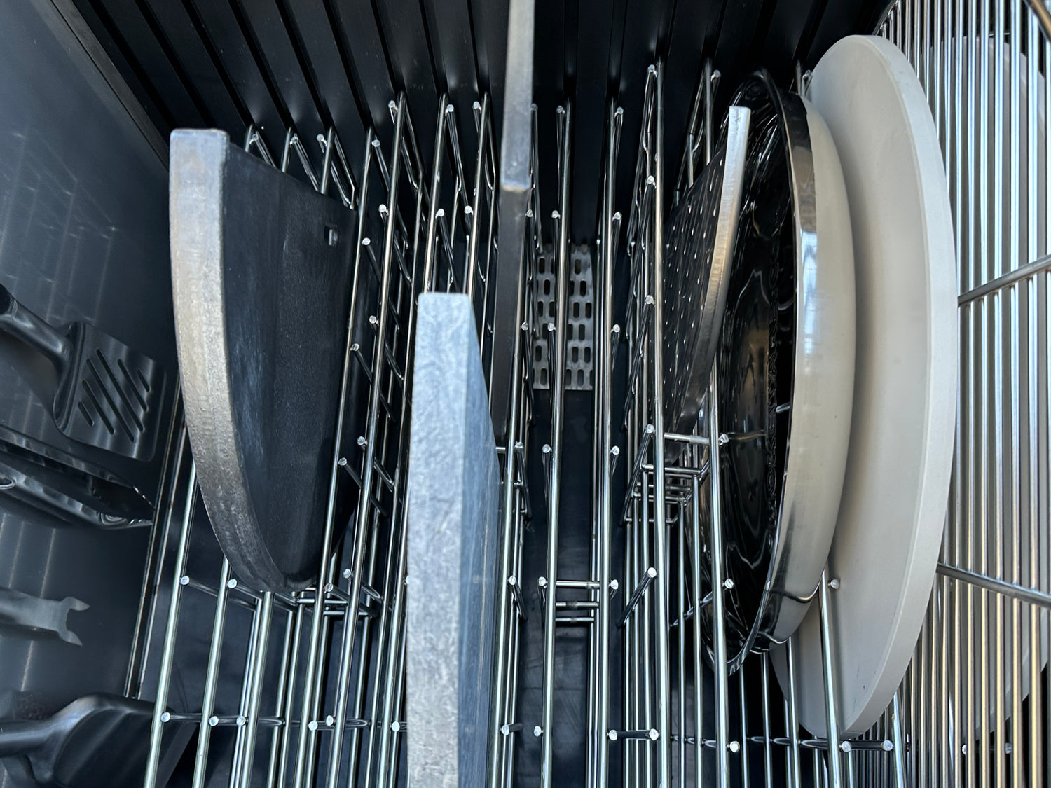 Store your large and small grill accessories from pizza stones, to broiler plates, and beyond.